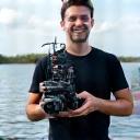 Photo of Ben Carter with his underwater camera setup.